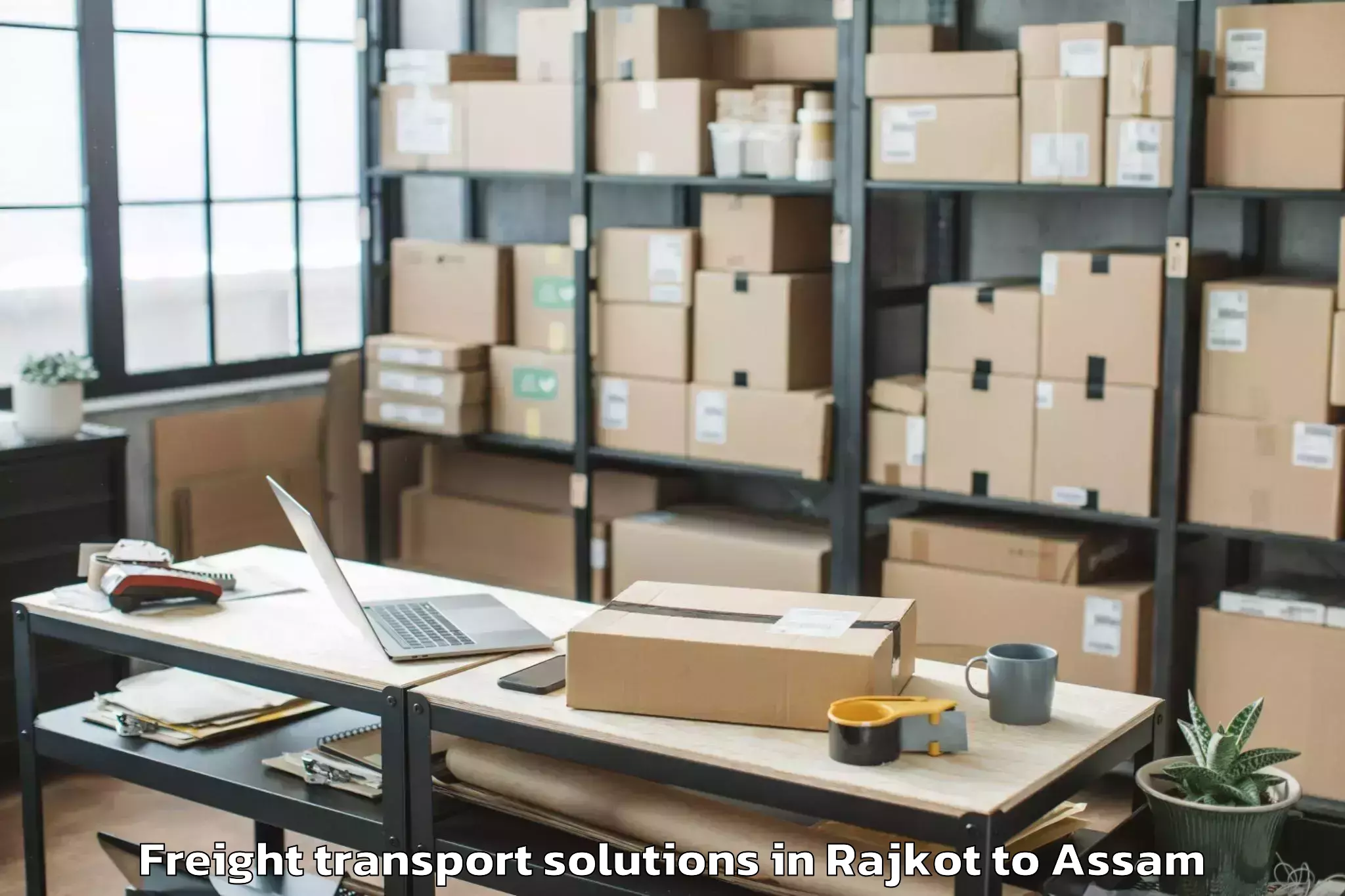 Book Rajkot to Dibrugarh University Freight Transport Solutions Online